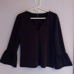 Ann Taylor V neck ruffle sleeve black popover top.